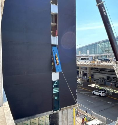 1078 ABayazeed Contractor Installing Window Panels