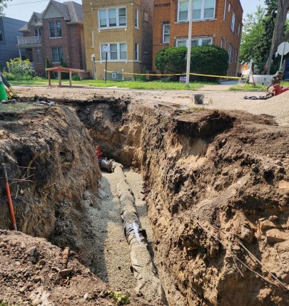 !+Picture 1. Watermain installation at the intersection of W. Winnemac Ave and N. Leclaire Ave